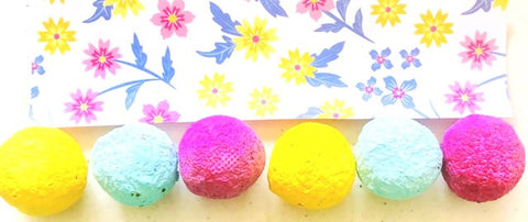 Wildflower Seed Bombs with Flowers Background